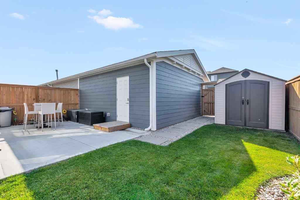 MLS® A2258347 - 1098 Creekside Boulevard SW in Pine Creek Calgary, Residential