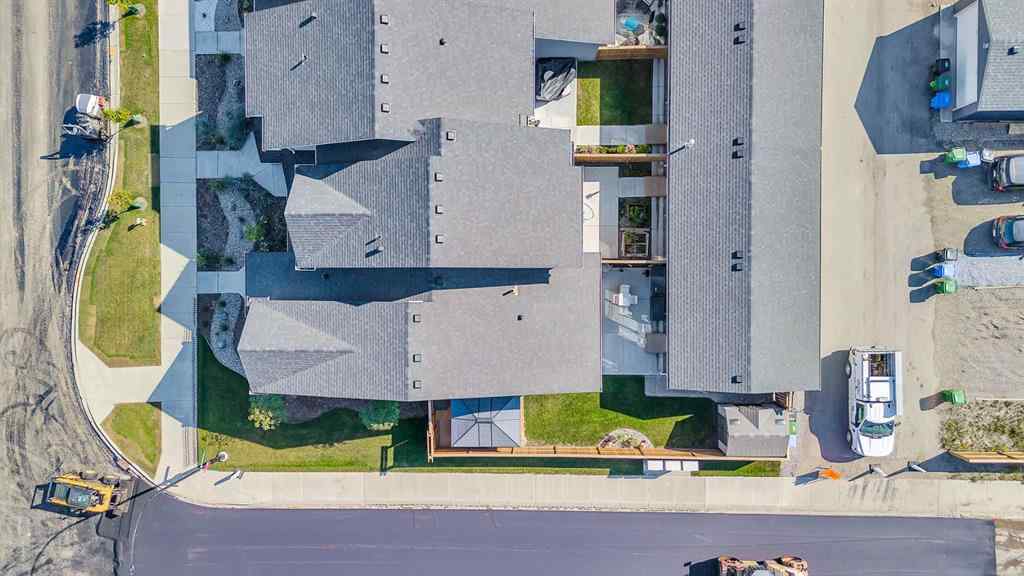 MLS® A2258347 - 1098 Creekside Boulevard SW in Pine Creek Calgary, Residential