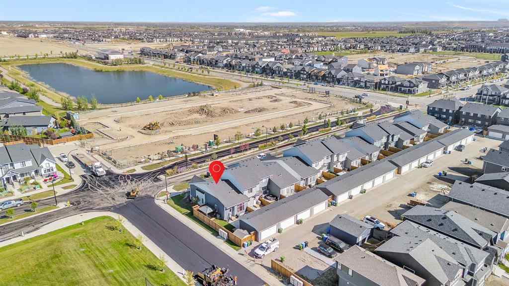 MLS® A2258347 - 1098 Creekside Boulevard SW in Pine Creek Calgary, Residential