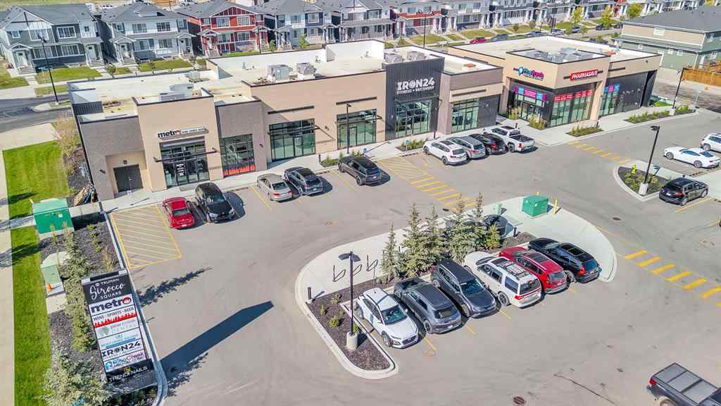 MLS® A2258347 - 1098 Creekside Boulevard SW in Pine Creek Calgary, Residential