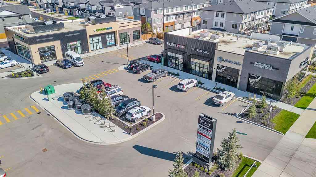 MLS® A2258347 - 1098 Creekside Boulevard SW in Pine Creek Calgary, Residential