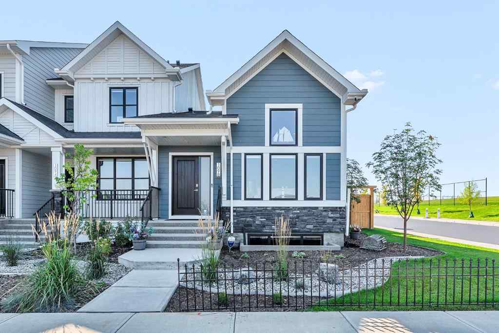 MLS® A2258347 - 1098 Creekside Boulevard SW in Pine Creek Calgary, Residential