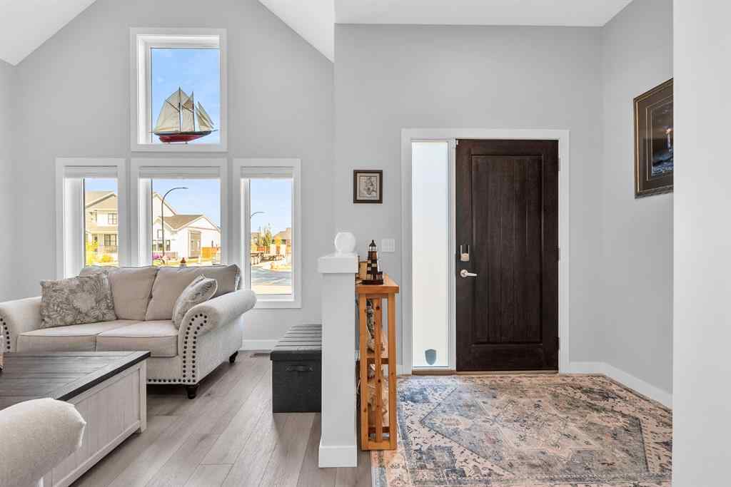 MLS® A2258347 - 1098 Creekside Boulevard SW in Pine Creek Calgary, Residential