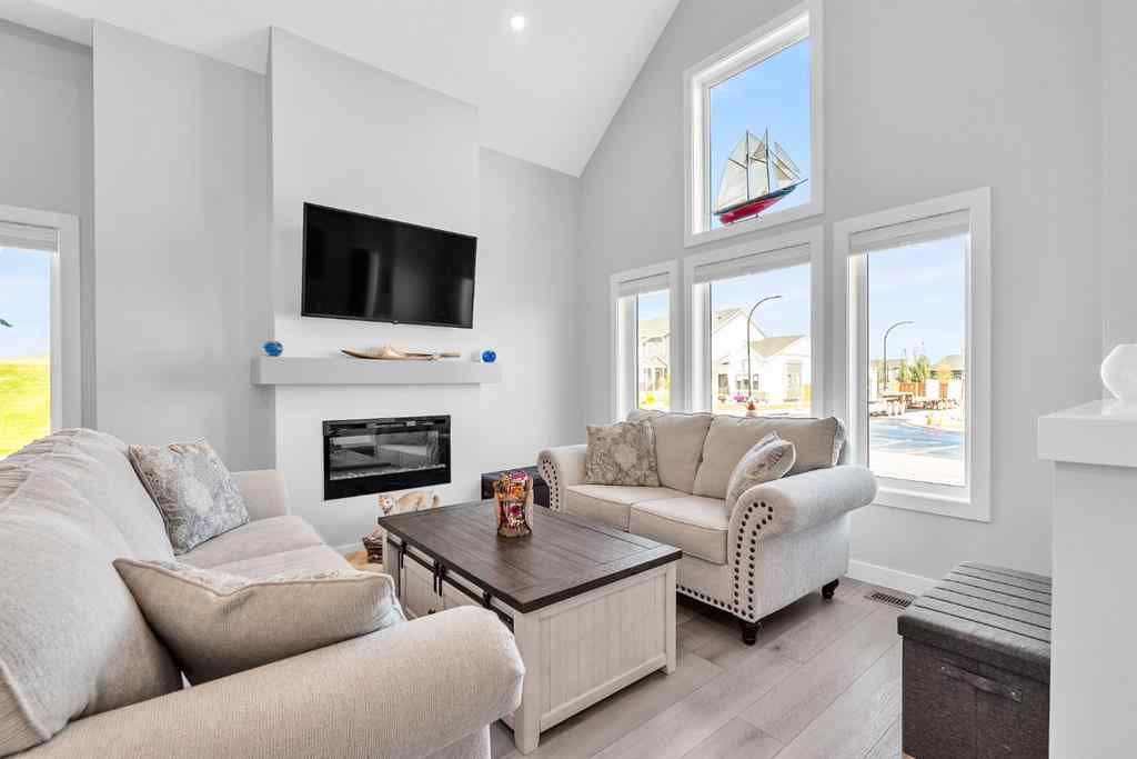 MLS® A2258347 - 1098 Creekside Boulevard SW in Pine Creek Calgary, Residential