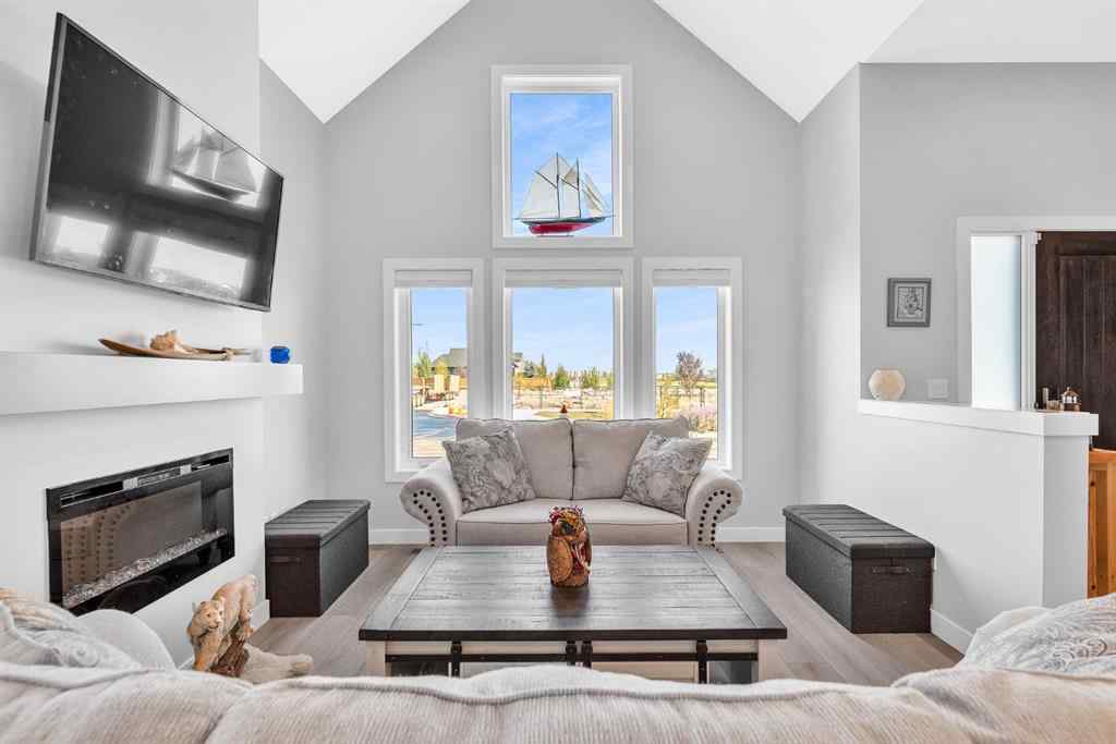 MLS® A2258347 - 1098 Creekside Boulevard SW in Pine Creek Calgary, Residential