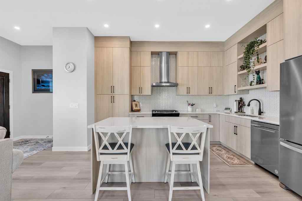 MLS® A2258347 - 1098 Creekside Boulevard SW in Pine Creek Calgary, Residential