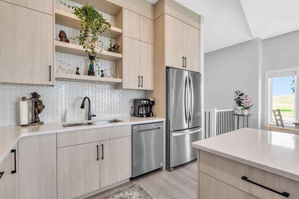 MLS® A2258347 - 1098 Creekside Boulevard SW in Pine Creek Calgary, Residential