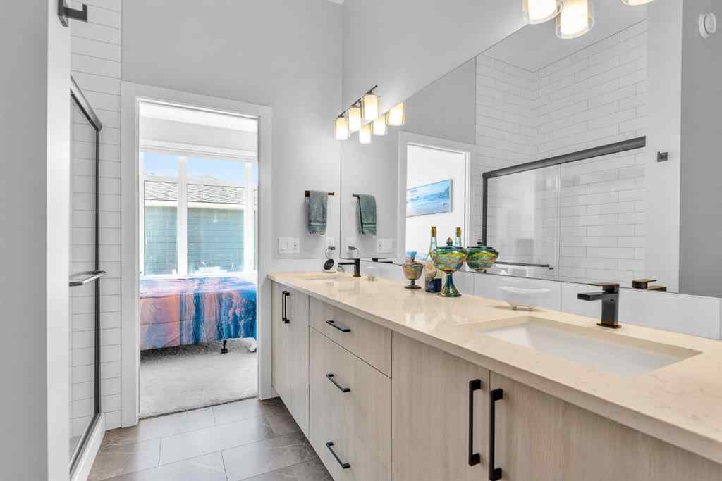 MLS® A2258347 - 1098 Creekside Boulevard SW in Pine Creek Calgary, Residential