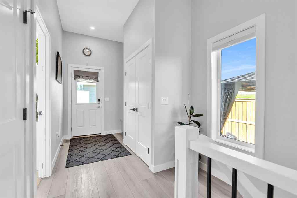 MLS® A2258347 - 1098 Creekside Boulevard SW in Pine Creek Calgary, Residential
