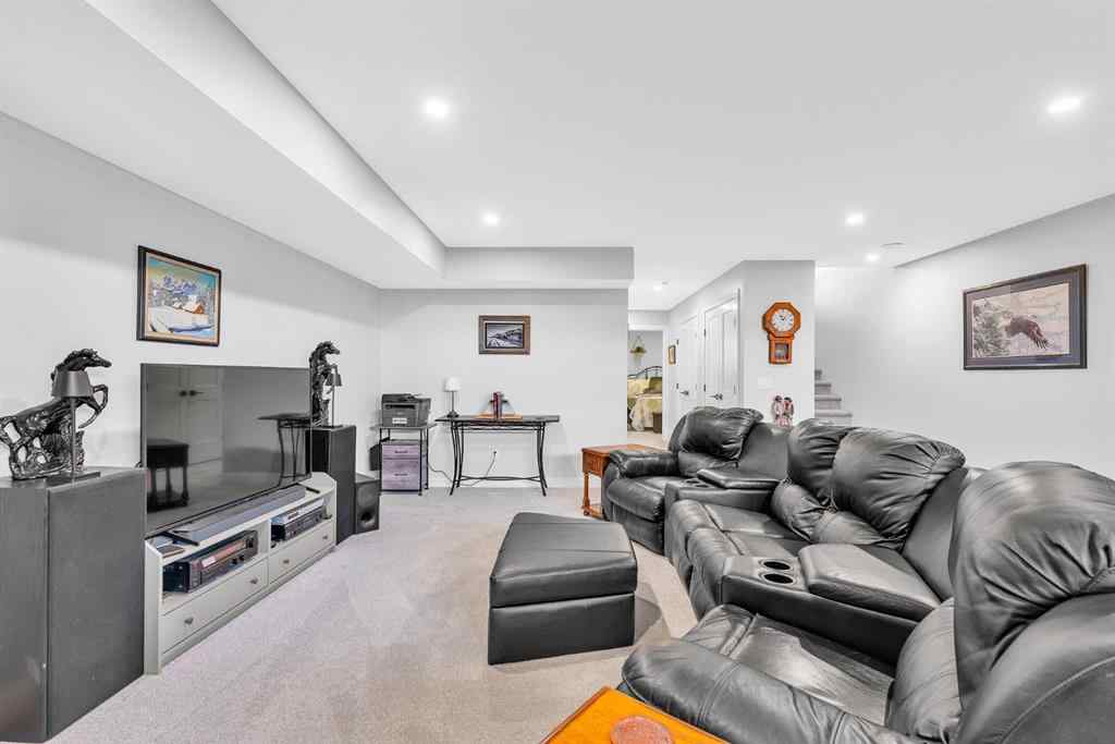 MLS® A2258347 - 1098 Creekside Boulevard SW in Pine Creek Calgary, Residential