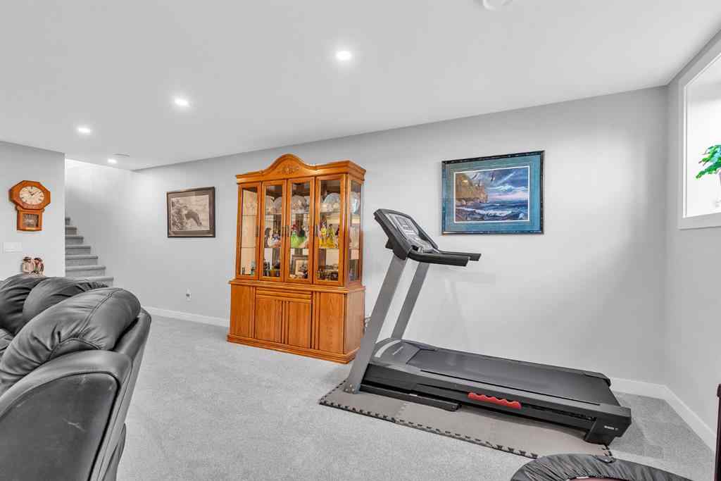 MLS® A2258347 - 1098 Creekside Boulevard SW in Pine Creek Calgary, Residential