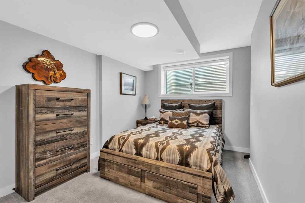 MLS® A2258347 - 1098 Creekside Boulevard SW in Pine Creek Calgary, Residential