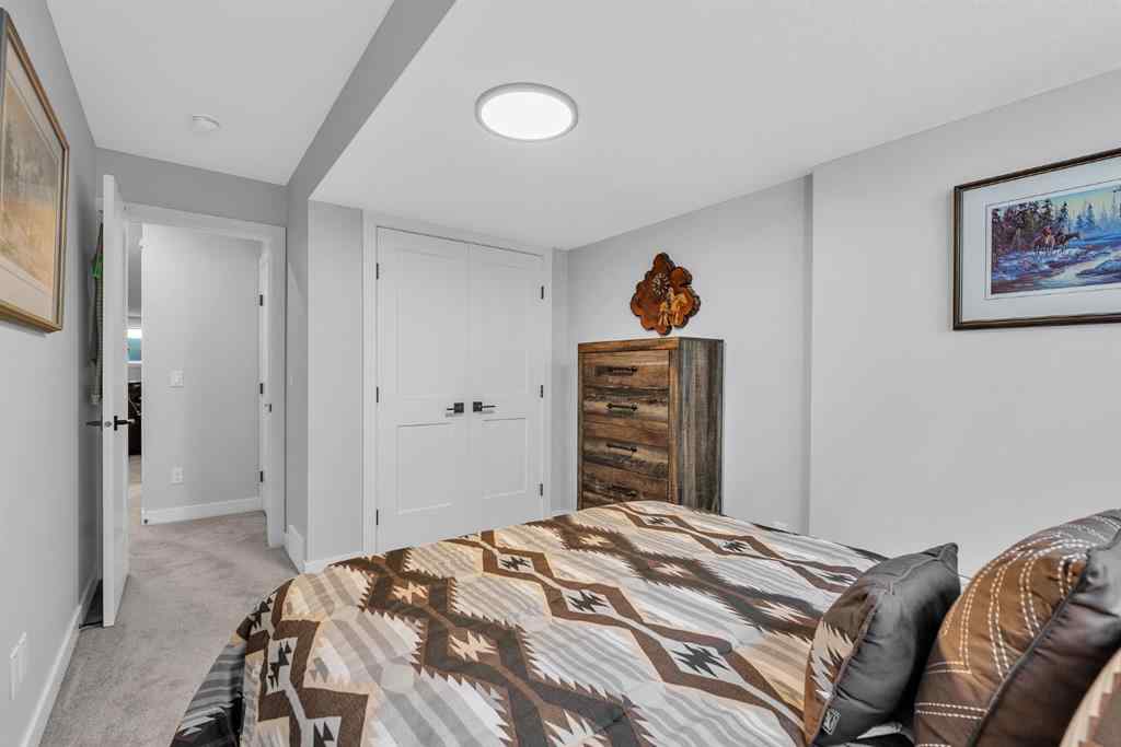 MLS® A2258347 - 1098 Creekside Boulevard SW in Pine Creek Calgary, Residential