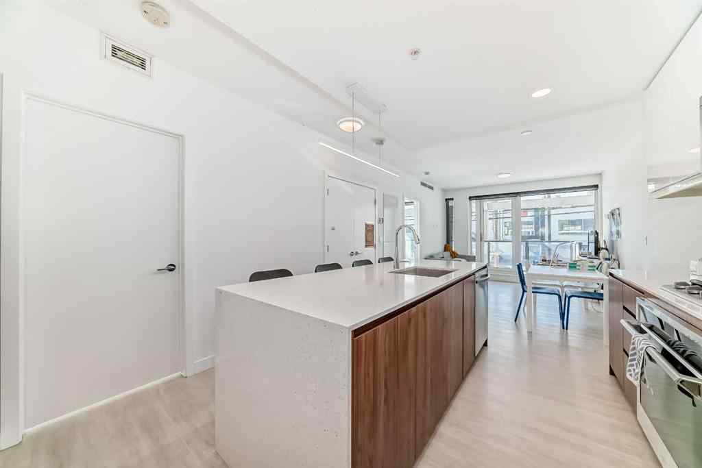 MLS® A2258366 - Unit #202 327 9A Street NW in Sunnyside Calgary, Residential