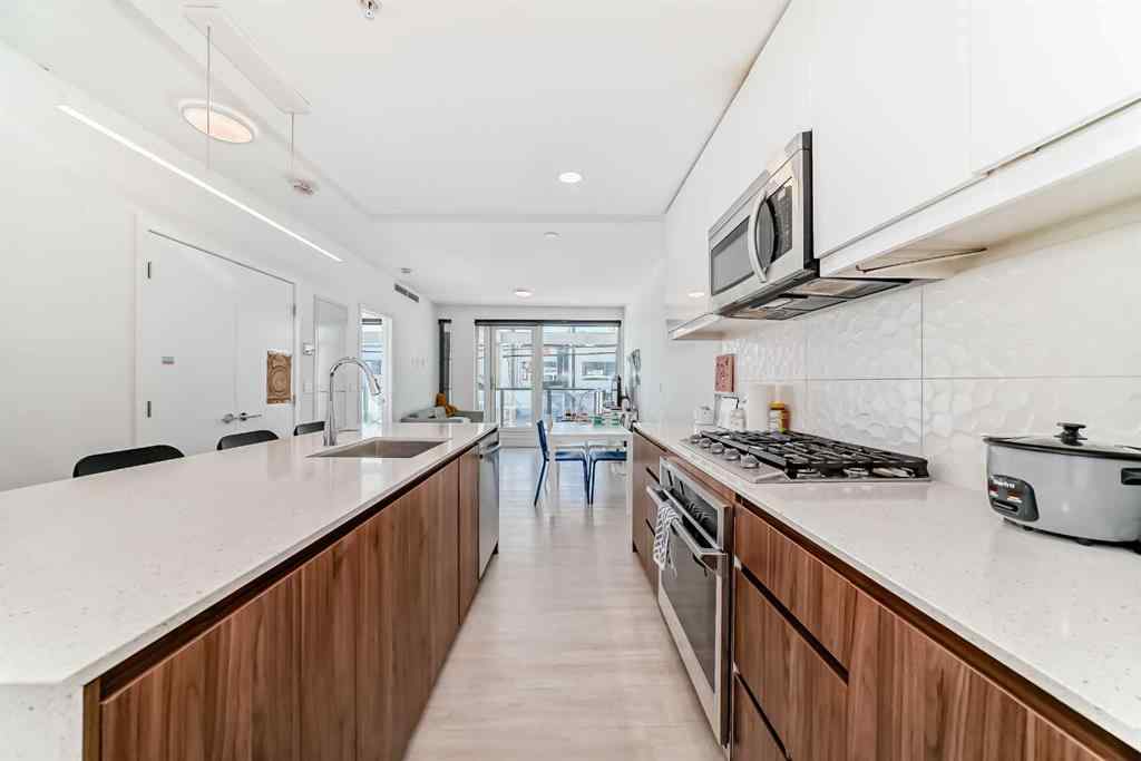 MLS® A2258366 - Unit #202 327 9A Street NW in Sunnyside Calgary, Residential
