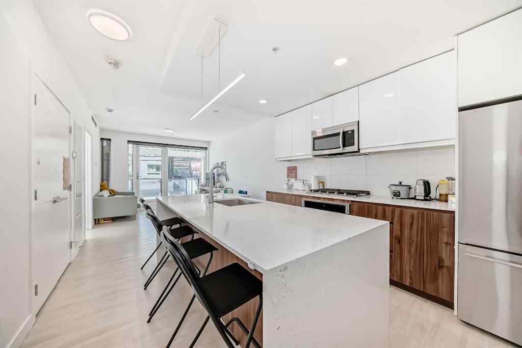 MLS® A2258366 - Unit #202 327 9A Street NW in Sunnyside Calgary, Residential