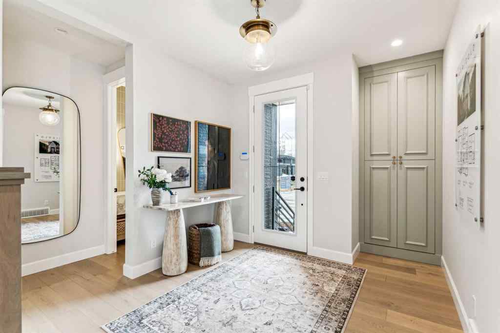 MLS® A2258376 - 211 Calais Drive SW in Currie Barracks Calgary, Residential