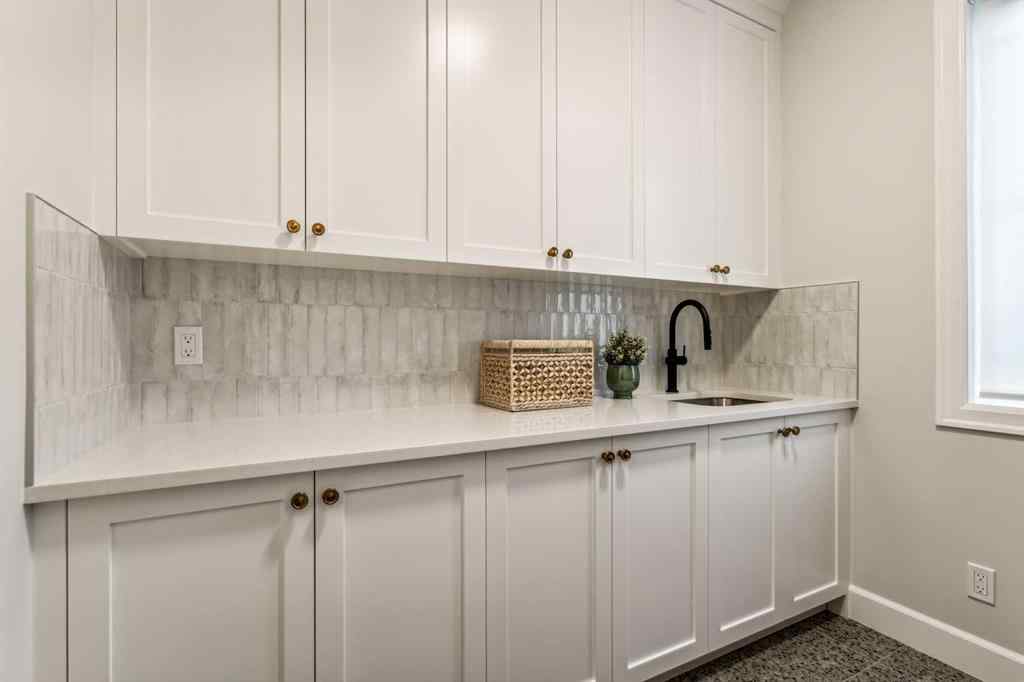 MLS® A2258376 - 211 Calais Drive SW in Currie Barracks Calgary, Residential