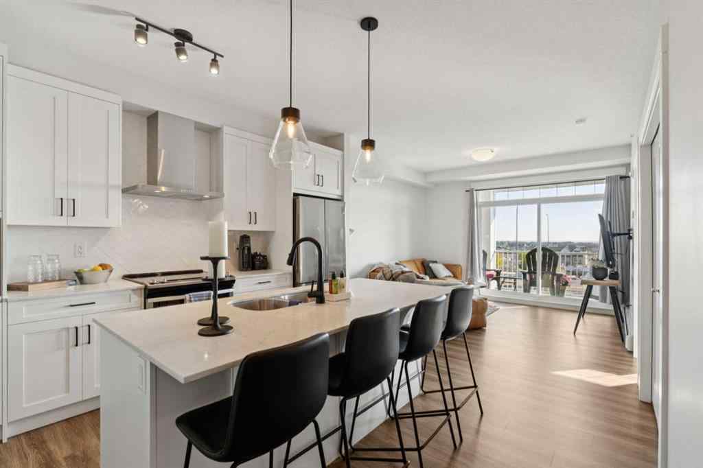 MLS® A2258398 - Unit #417 400 Auburn Meadows Common SE in Auburn Bay Calgary, Residential