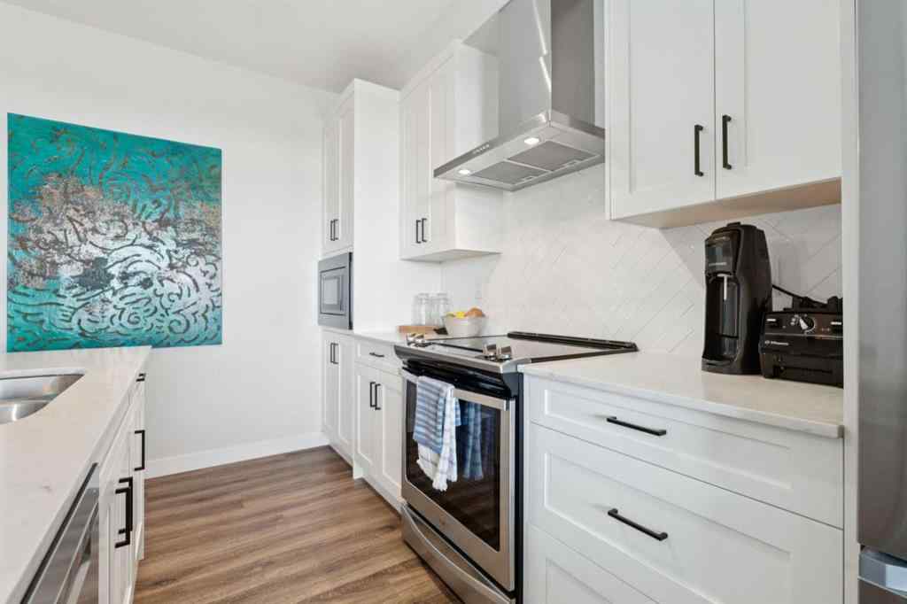 MLS® A2258398 - Unit #417 400 Auburn Meadows Common SE in Auburn Bay Calgary, Residential
