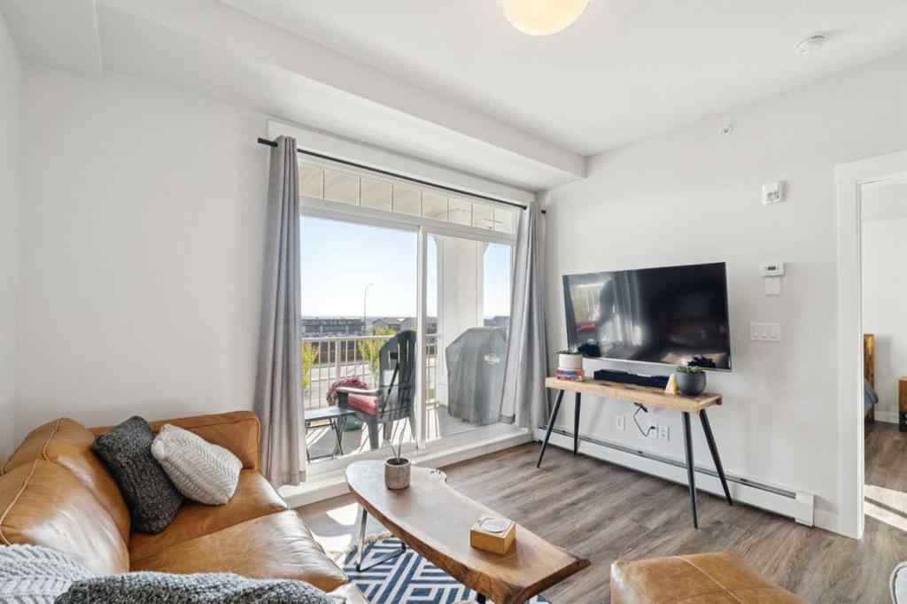MLS® A2258398 - Unit #417 400 Auburn Meadows Common SE in Auburn Bay Calgary, Residential