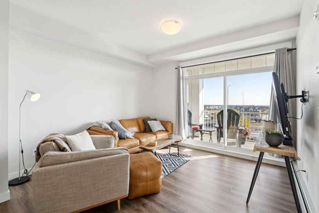 MLS® A2258398 - Unit #417 400 Auburn Meadows Common SE in Auburn Bay Calgary, Residential