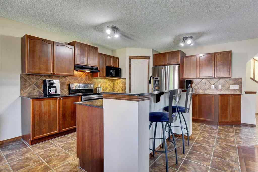 MLS® A2258399 - 78 Cougarstone Close SW in Cougar Ridge Calgary, Residential