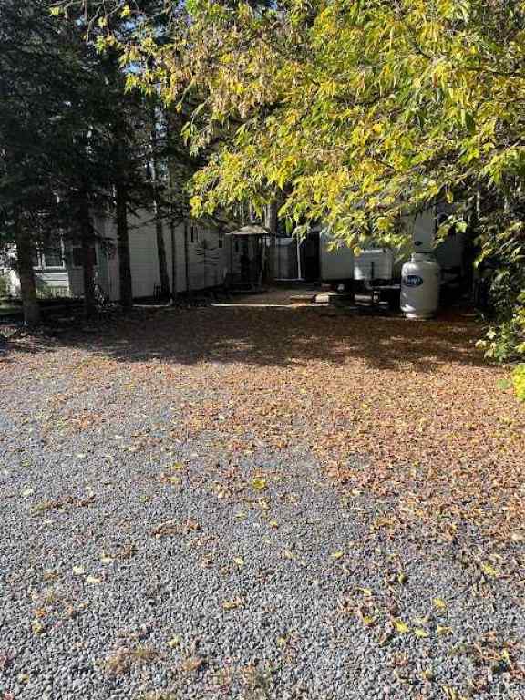 MLS® A2258414 - Unit #15 TIMBER DRIVE 27 5230 Highway  in Tall Timber Rural Mountain View County, Land