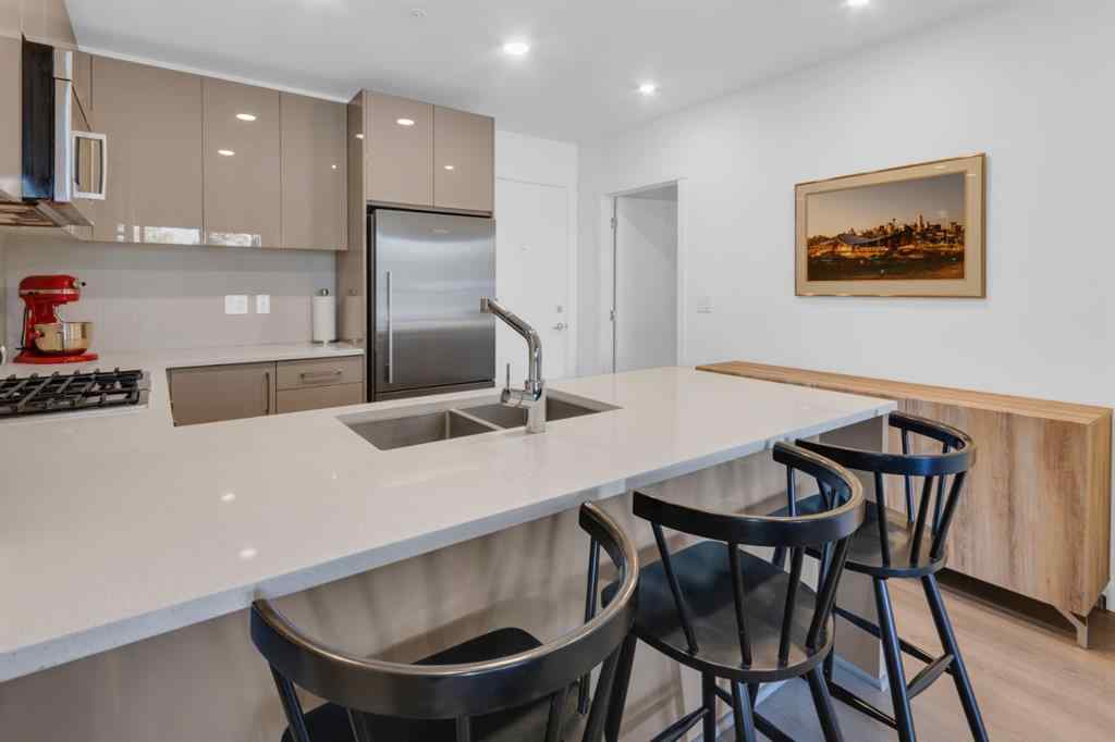 MLS® A2258419 - Unit #211 301 10 Street NW in Hillhurst Calgary, Residential