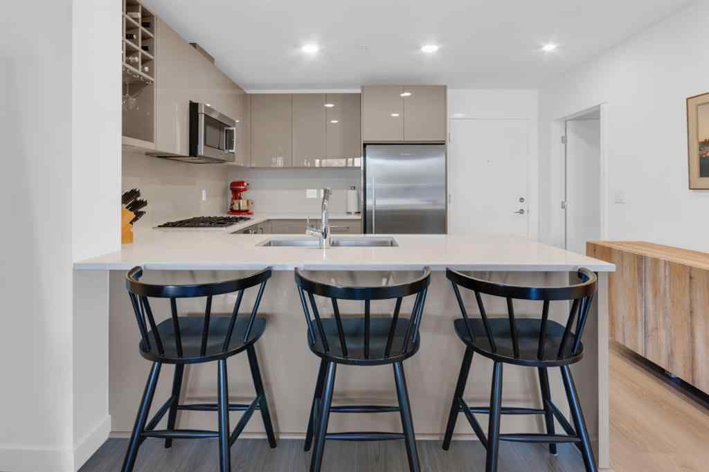 MLS® A2258419 - Unit #211 301 10 Street NW in Hillhurst Calgary, Residential
