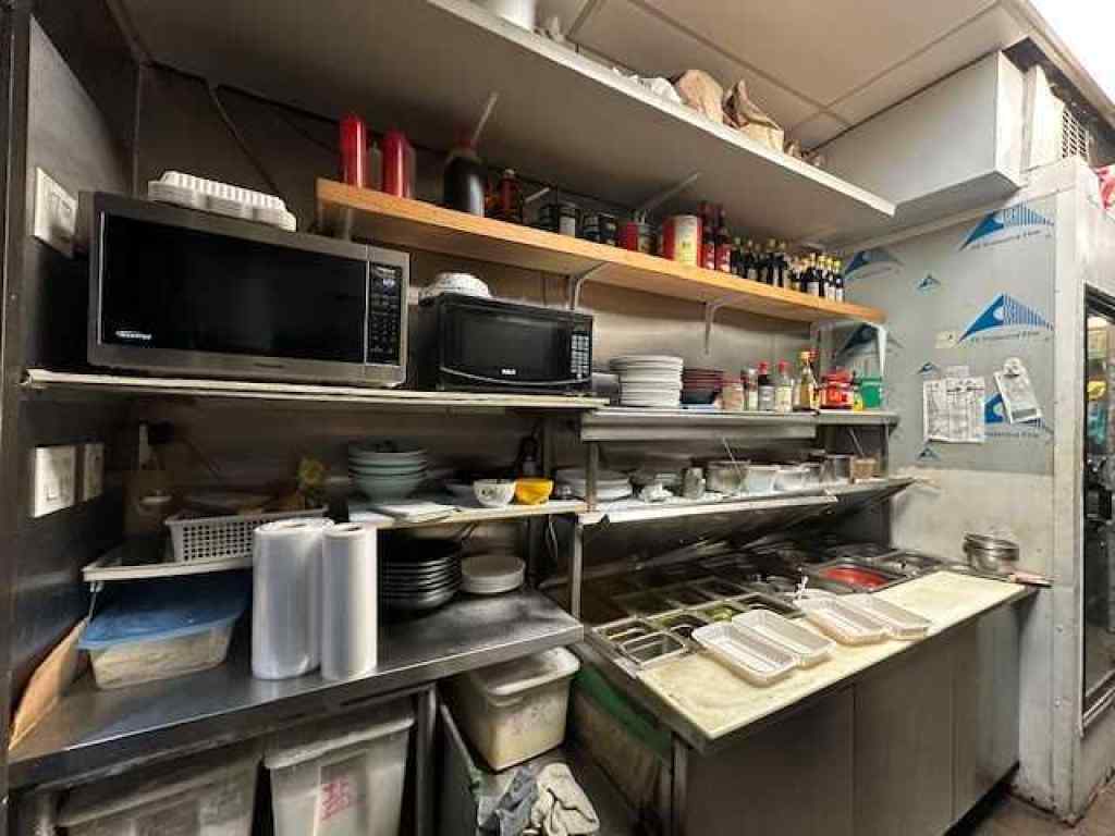 MLS® A2258420 - Unit #104 303 Centre Street SW in Chinatown Calgary, Commercial