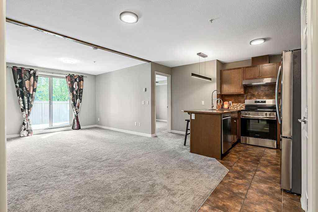 MLS® A2258429 - Unit #2105 92 Crystal Shores Road  in Crystal Shores Okotoks, Residential