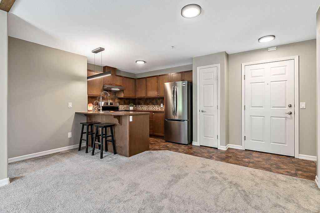 MLS® A2258429 - Unit #2105 92 Crystal Shores Road  in Crystal Shores Okotoks, Residential