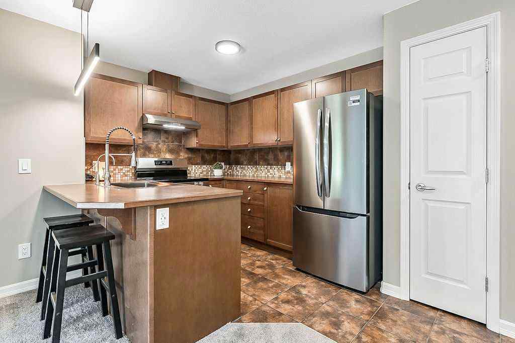 MLS® A2258429 - Unit #2105 92 Crystal Shores Road  in Crystal Shores Okotoks, Residential
