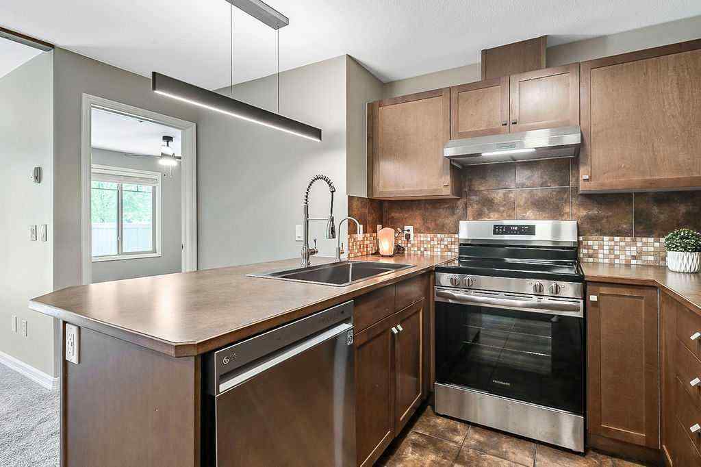 MLS® A2258429 - Unit #2105 92 Crystal Shores Road  in Crystal Shores Okotoks, Residential