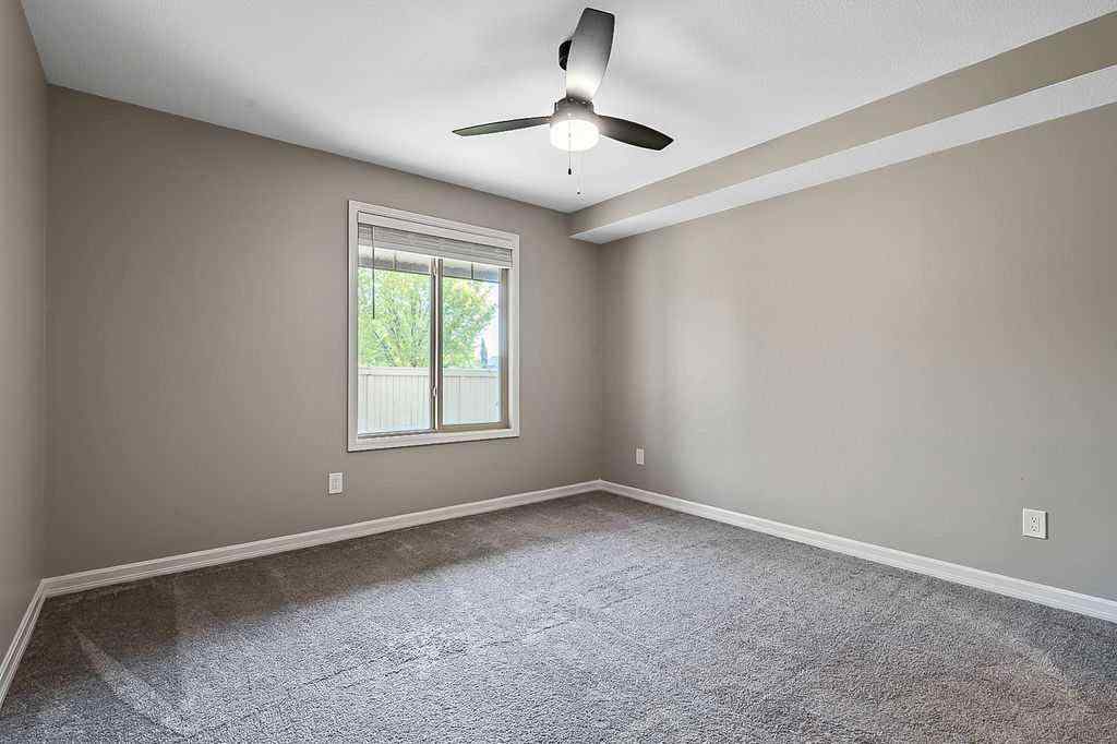 MLS® A2258429 - Unit #2105 92 Crystal Shores Road  in Crystal Shores Okotoks, Residential