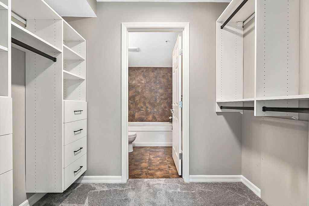 MLS® A2258429 - Unit #2105 92 Crystal Shores Road  in Crystal Shores Okotoks, Residential