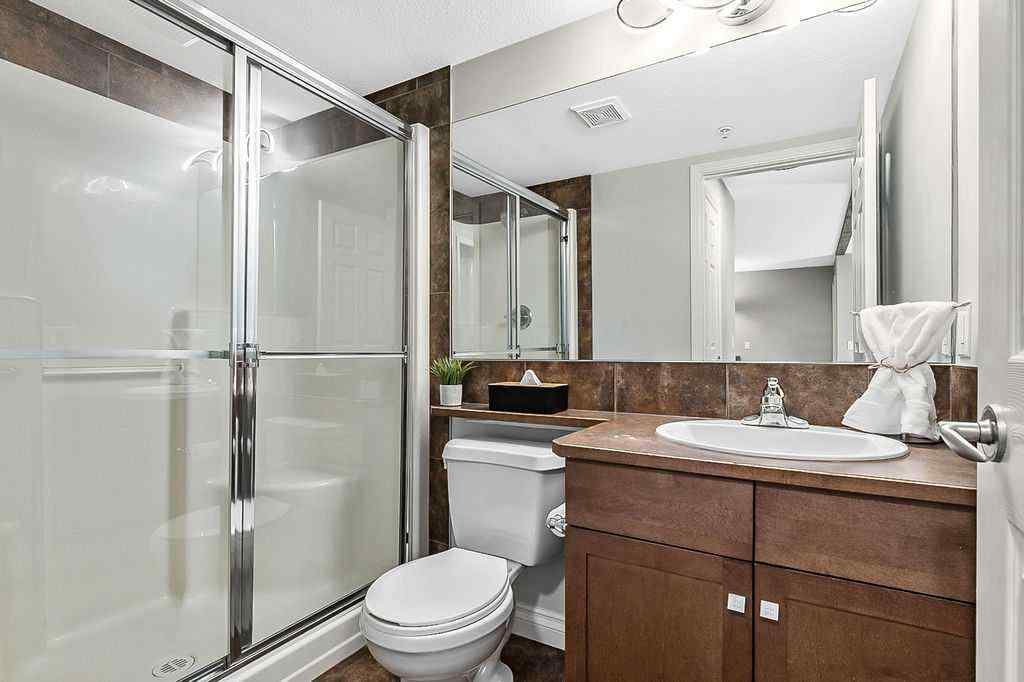 MLS® A2258429 - Unit #2105 92 Crystal Shores Road  in Crystal Shores Okotoks, Residential