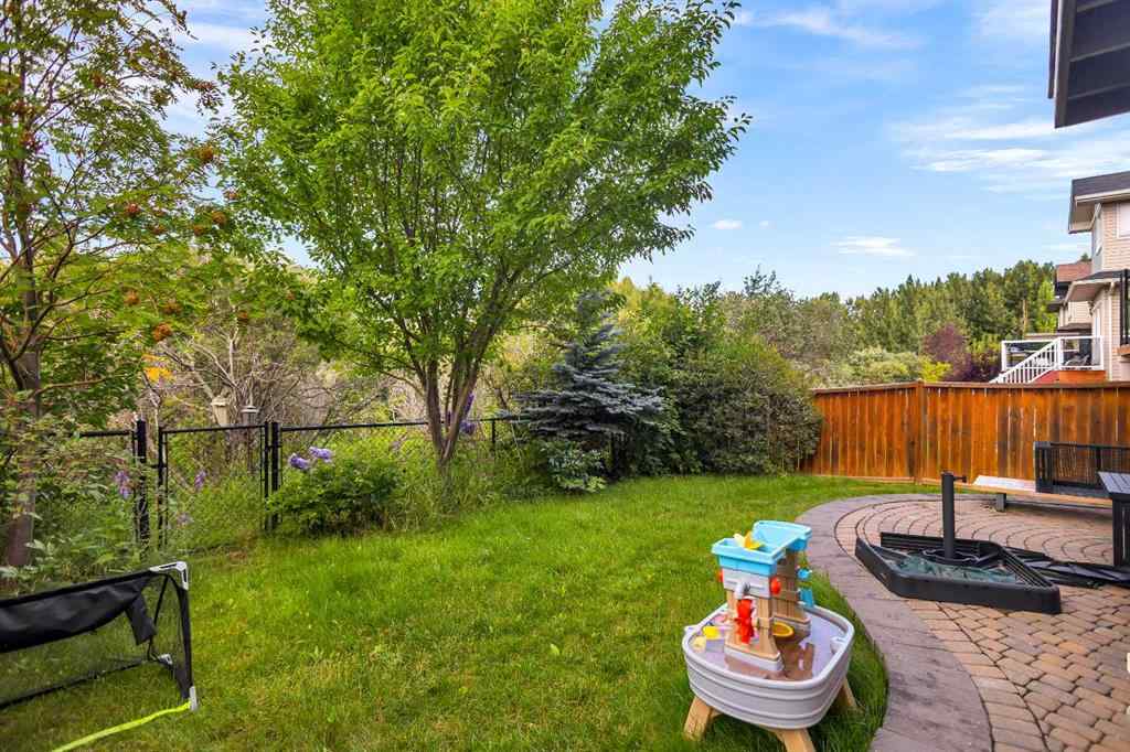 MLS® A2258439 - 511 Cresthaven Place SW in Crestmont Calgary, Residential