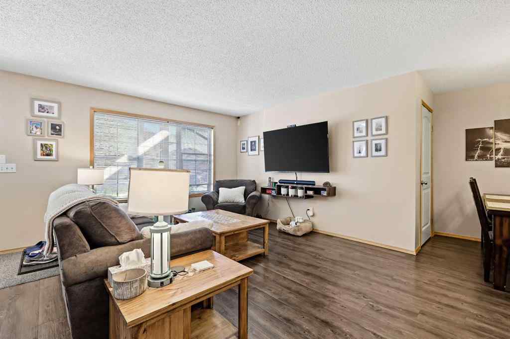 MLS® A2258443 - Unit #104 15 Everridge Square SW in Evergreen Calgary, Residential