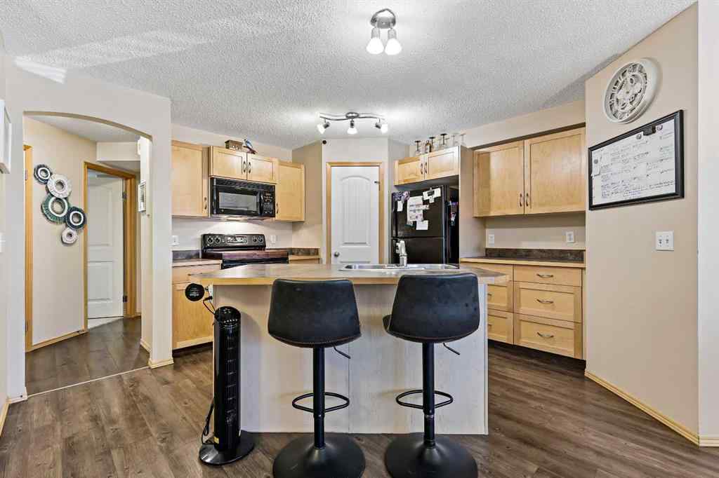 MLS® A2258443 - Unit #104 15 Everridge Square SW in Evergreen Calgary, Residential
