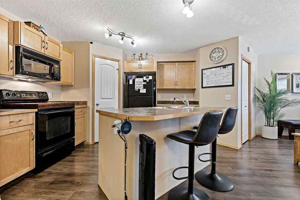 MLS® A2258443 - Unit #104 15 Everridge Square SW in Evergreen Calgary, Residential