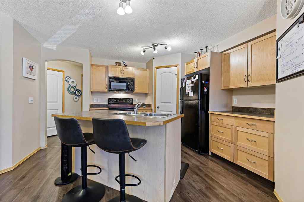 MLS® A2258443 - Unit #104 15 Everridge Square SW in Evergreen Calgary, Residential