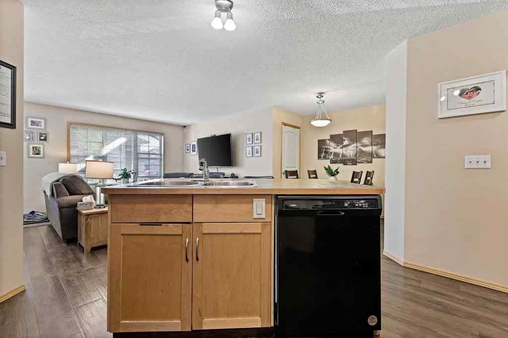MLS® A2258443 - Unit #104 15 Everridge Square SW in Evergreen Calgary, Residential
