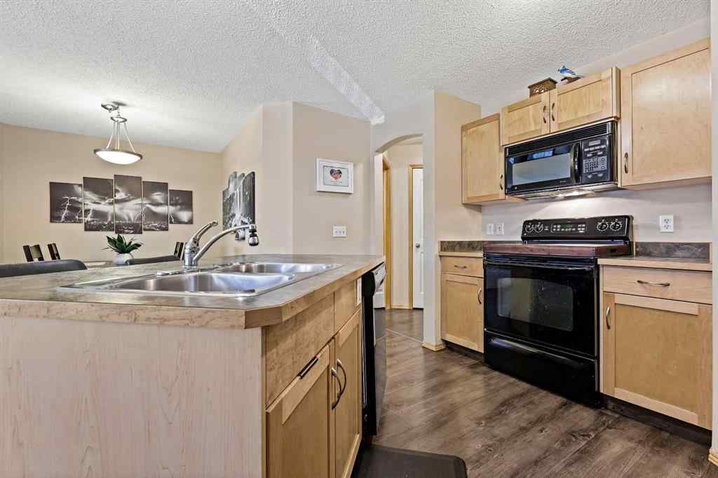 MLS® A2258443 - Unit #104 15 Everridge Square SW in Evergreen Calgary, Residential