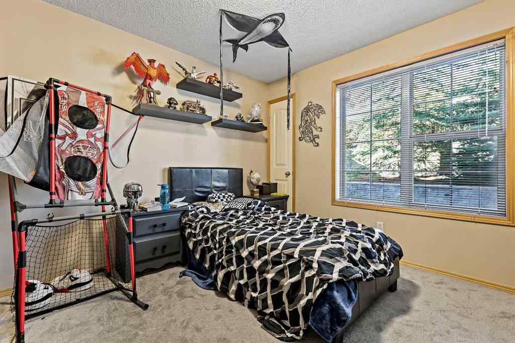 MLS® A2258443 - Unit #104 15 Everridge Square SW in Evergreen Calgary, Residential
