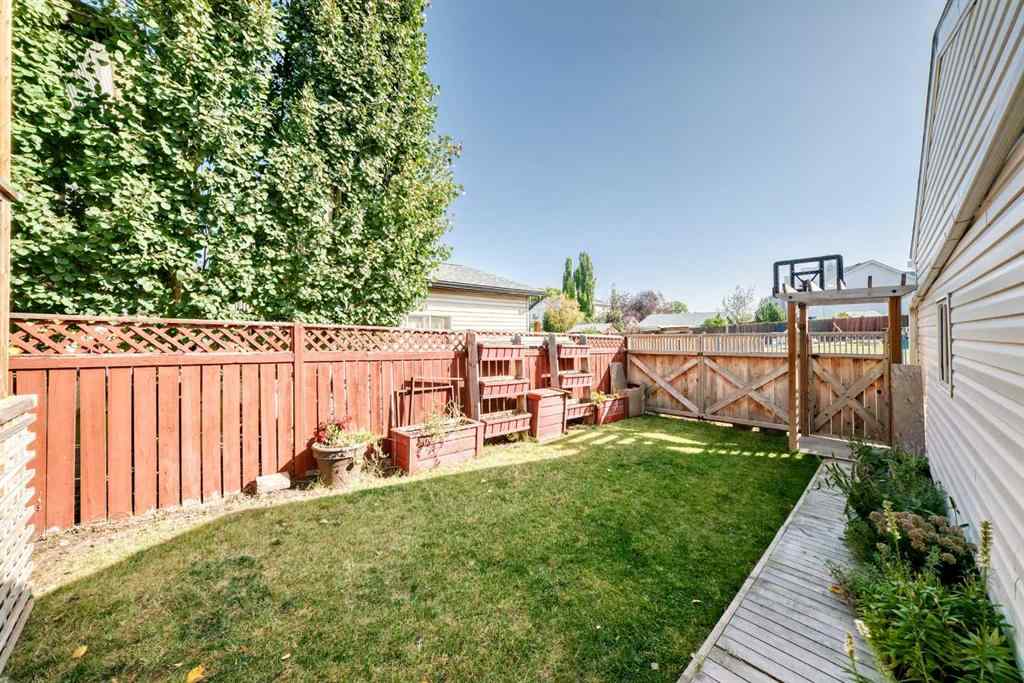 MLS® A2258454 - 14844 Mt Mckenzie Drive SE in McKenzie Lake Calgary, Residential