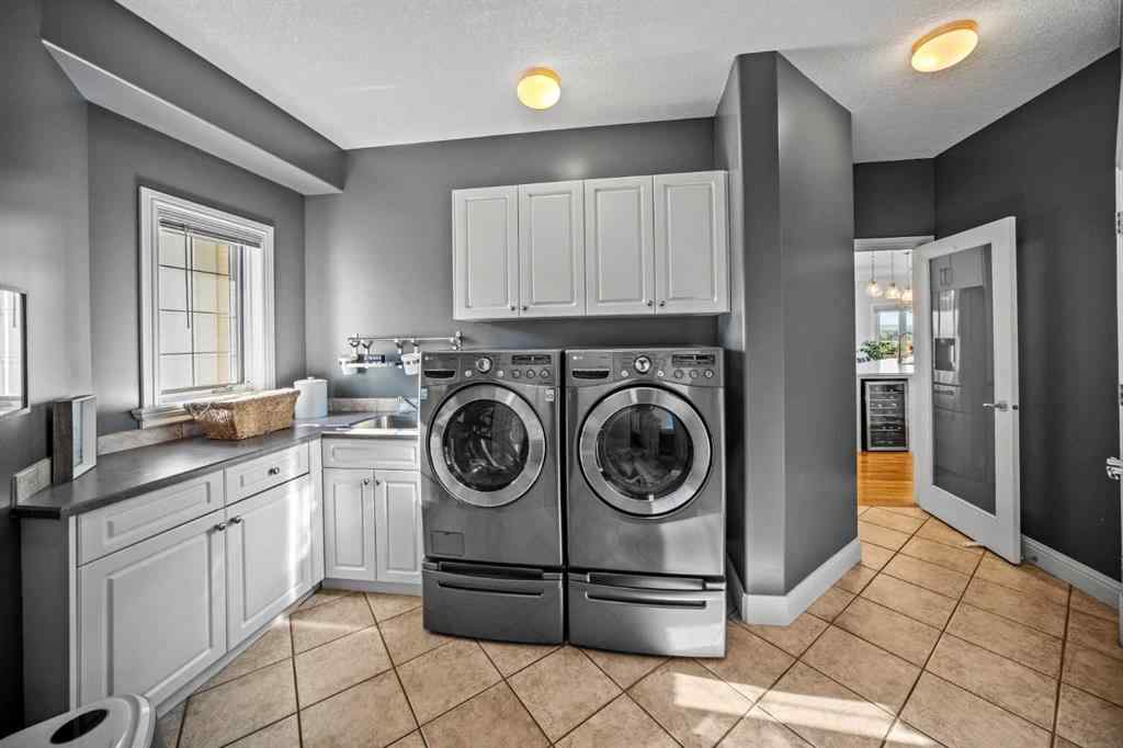 MLS® A2258471 - 171 Slopeview Drive SW in Springbank Hill Calgary, Residential