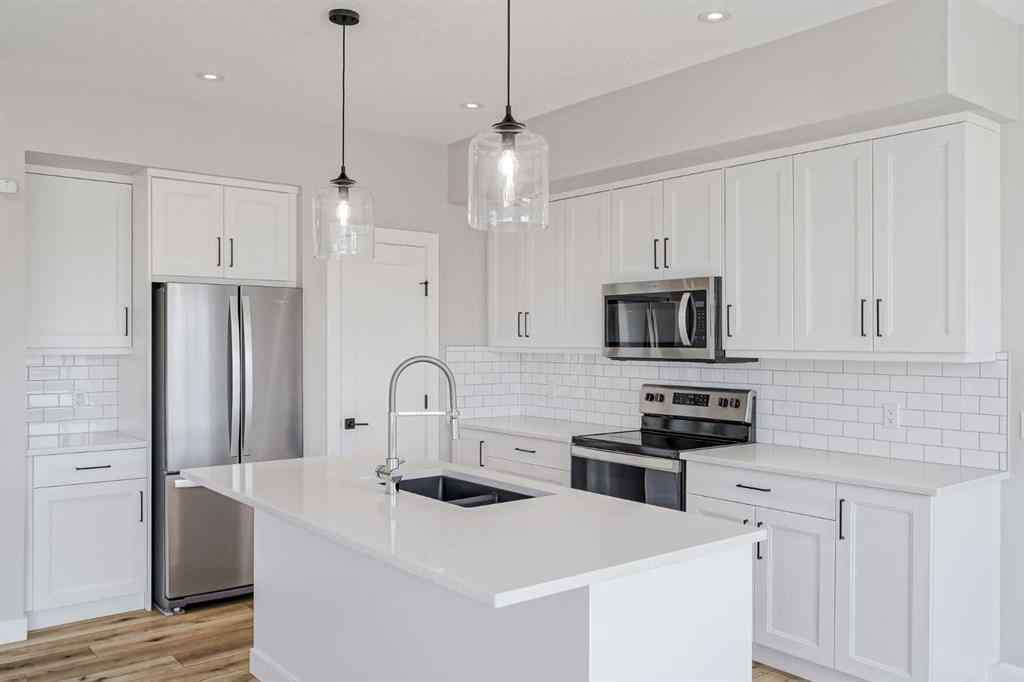 MLS® A2258529 - 28 Willow Street  in The Willows Cochrane, Residential