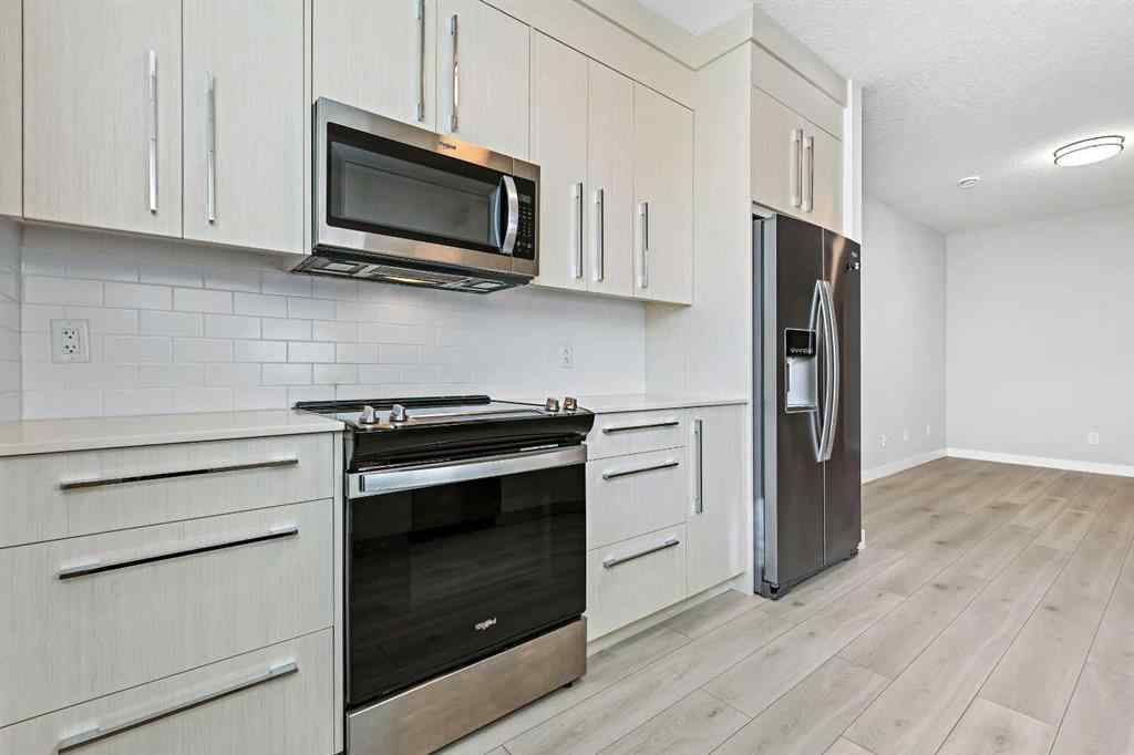 MLS® A2258533 - 193 Creekside Drive SW in Pine Creek Calgary, Residential